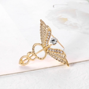 Golden Caduceus angel wing brooch with sparkling rhinestones for medical suit lapel