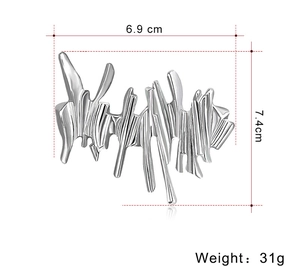 Detailed size view of silver liquid metal brooch showing 6.9cm width and 7.4cm height