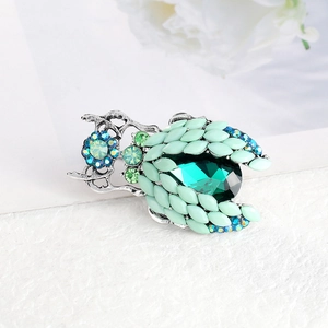 Fashionable beetle brooch with green rhinestones and silver metal insect pin for women