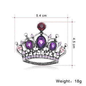 Vintage silver crown brooch with purple rhinestones measuring 5.4cm by 4.5cm
