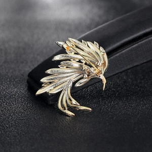 Elegant gold phoenix brooch for suits and dresses, detailed wing texture back view