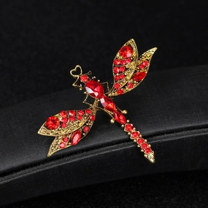 Vintage gold dragonfly brooch pin with red rhinestones and sparkling crystals