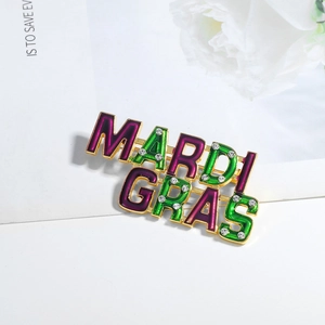 Golden Mardi Gras alphabet brooch with purple and green enamel and crystal accents