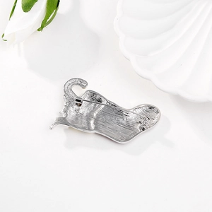 Christmas stocking brooch in silver metal showing high-quality back pin detail and texture