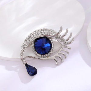 Broche œil artistique en argent avec pierre bleue et pendentif larme en cristal bleu