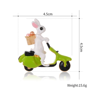 Cute bunny on scooter brooch in enamel alloy with dimensions 4.5cm and 15.6g weight