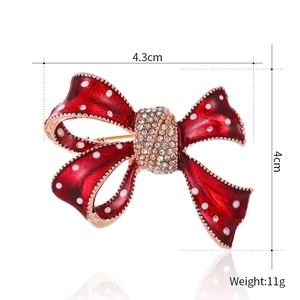 Red bowknot brooch with white polka dots and crystals, size 4.3cm by 4cm, weight 11g
