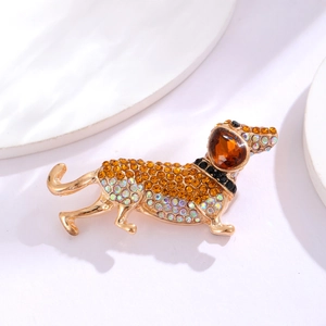 Sparkling dachshund puppy brooch with amber crystals and gold-plated finish for suit