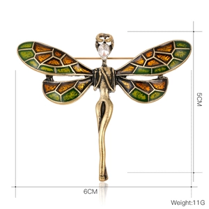 Broche libellule vintage aux ailes d'ange, design en émail coloré et strass étincelant