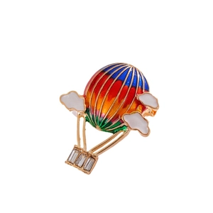 Hot air balloon brooch with colorful enamel clouds and rectangular crystal accents