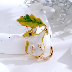 Cartoon mouse with green leaf brooch, enamel fashion accessory for coats and jackets