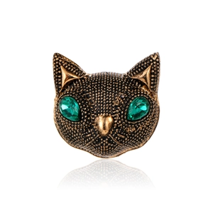 Broche de cabeza de gato de bronce vintage con ojos de piedras verdes y metal texturizado