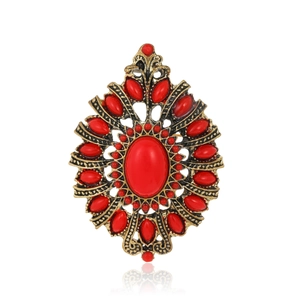 Detail einer Vintage-Brosche im Palaststil mit roten Kristallen und Antikbronze-Finish