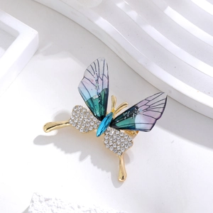 Exquisite butterfly brooch with blue-purple gradient wings and sparkling rhinestones