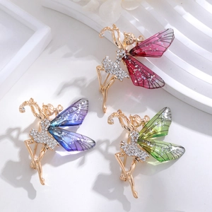 Elegante Brosche mit Ballett-Fee, Glitzersteinen und bunten Flügeln in Gold-Optik verziert