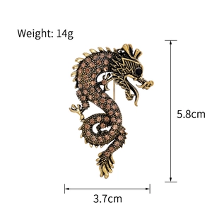 Chinese dragon brooch in antique gold finish with crystals and size dimensions