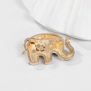 Golden elephant circus brooch with sparkling rhinestones and detailed enamel finish