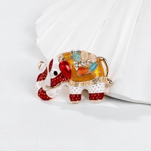 Detailed macro view of enamel circus elephant brooch with colorful rhinestones