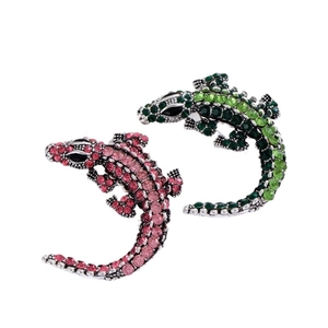 Vintage crocodile brooches with colorful rhinestones in pink and green gradient patterns
