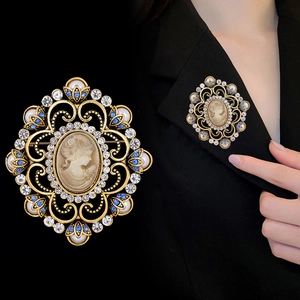Vintage Baroque cameo brooch with rhinestones and pearls on golden metal base
