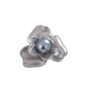 Elegant camellia flower brooch with grey pearl center and silver textured petals