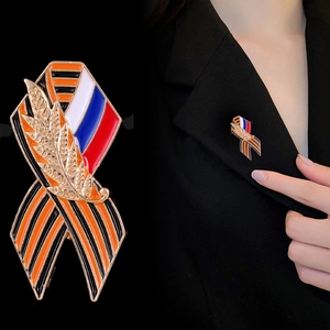Russian George Ribbon and Wheat Stalk Brooch with flag colors on a black suit lapel