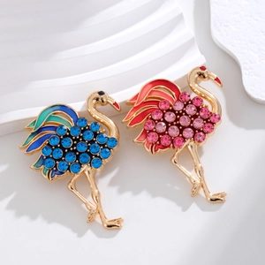 Elegante vintage flamingo broches met kleurrijke strass-steentjes en gouden afwerking