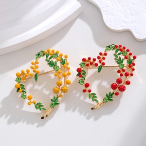 Vintage heart flower brooch with yellow berries and green enamel leaves for women