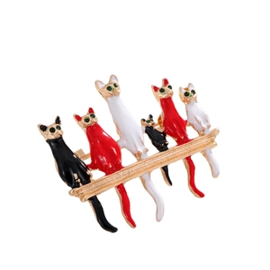 Set of six colorful enamel cartoon cat brooches with gold plating and green crystal eyes