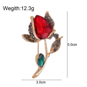 Eleganter Gold-Tulpen-Brosche mit großem rotem Tropfenstein und grünem Blattakzent