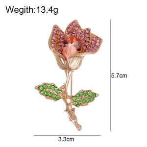 Elegant tulip flower brooch with pink rhinestones and gold finish, size 5.7cm by 3.3cm