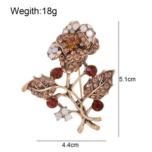 Vintage rose flower brooch with brown crystals and white stones in bronze alloy finish