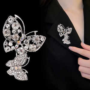 Sparkling silver double butterfly brooch with rhinestones for elegant suit lapel styling