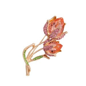 Elegant gold-plated tulip brooch featuring pink crystal petals and green rhinestones