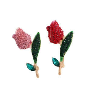 Elegant tulip brooches with pink and red crystals in a gold-plated floral setting