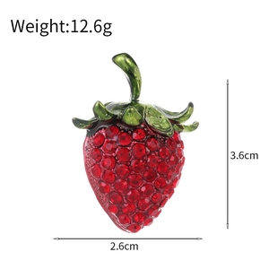 Elegant strawberry brooch with red rhinestones and green enamel leaves in 3.6cm size