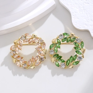 Elegante set di spille a corona di grano in cristallo color champagne e verde