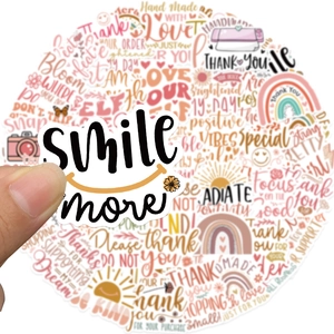 Bohemian style 'smile more' round sticker held by hand with warm color collage background