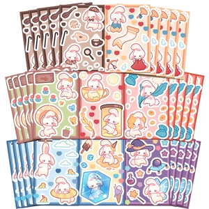 Close-up of waterproof cartoon rabbit stickers in multiple styles for DIY scrapbooking