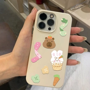 Cute Capybara and rabbit cartoon stickers on a beige silicone protective phone case