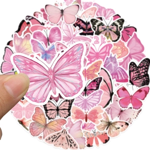 Close-up of pink butterfly stickers set with waterproof PVC material for DIY scrapbooking