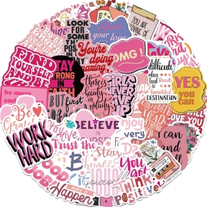Détail d'autocollants roses inspirants avec citations pour ordinateur et projets DIY