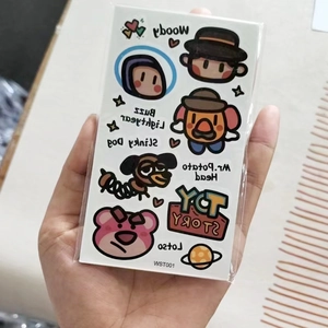 Detail of Toy Story characters tattoo stickers featuring Woody and Buzz Lightyear