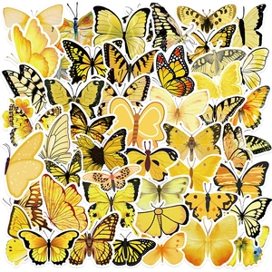 Close-up of assorted waterproof butterfly stickers in vibrant yellow and orange tones