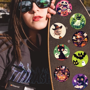 Waterproof Halloween stickers with ghost and pumpkin patterns on a skateboard surface