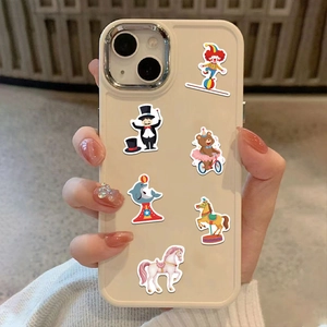 Close-up of cream iPhone case with circus theme circus clown and magician illustrations
