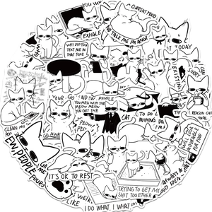 Close-up of funny black and white hand-drawn meme cat stickers for laptops and journals