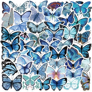 Close-up of cute blue butterfly PVC stickers for scrapbooking and decoration
