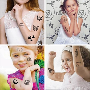 Temporary tattoo set for kids featuring cute black line art animals and nature motifs