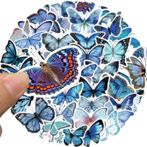 Close-up of waterproof butterfly stickers showing vibrant blue tones and precise cutouts
